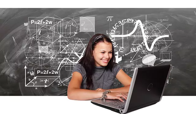 Student at a laptop in front of a chalkboard of equations, illustrating the mathematics of supervised deep learning