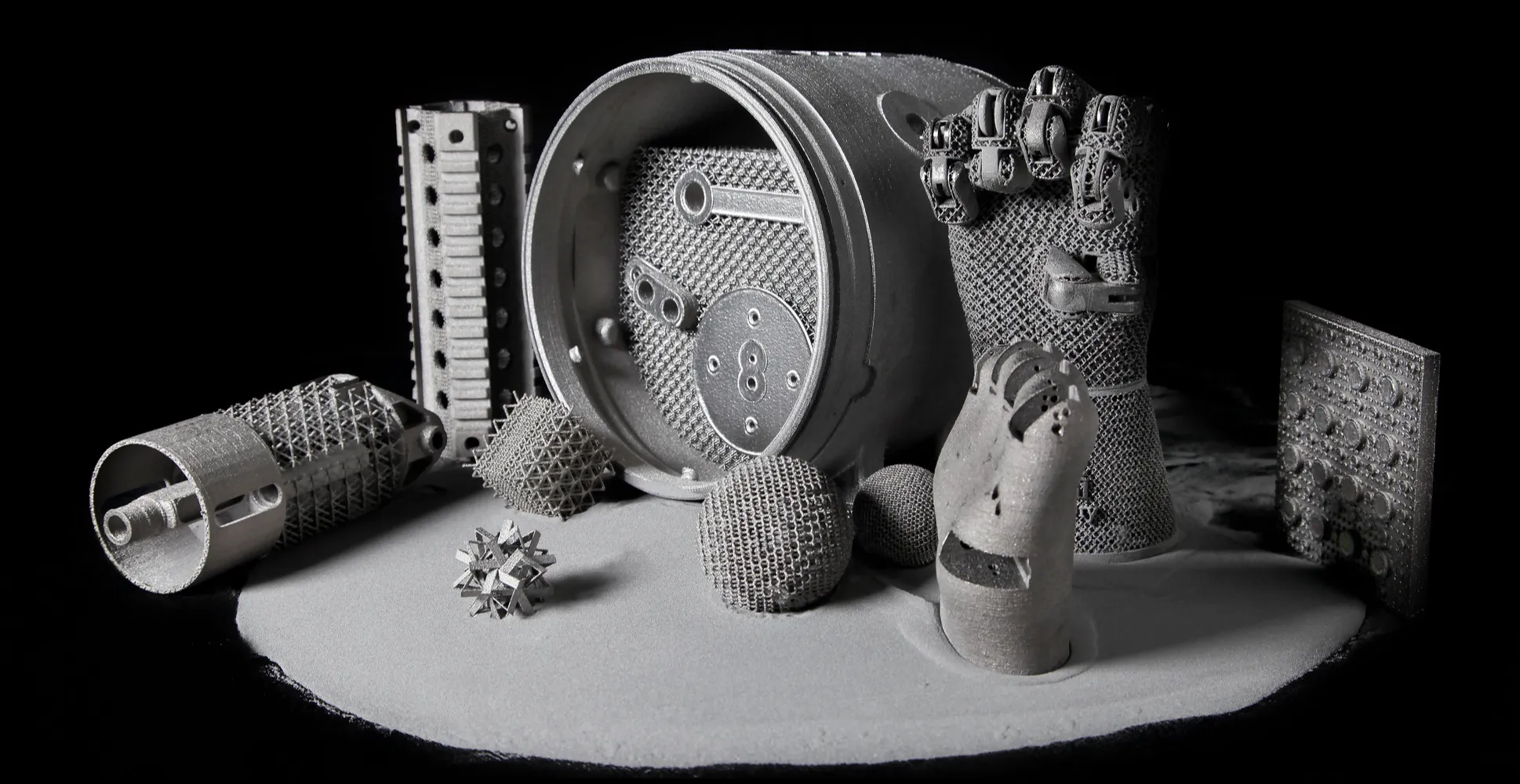 Titanium parts made by electron-beam additive manufacturing, including a functional lightweight robotic hand and lattices