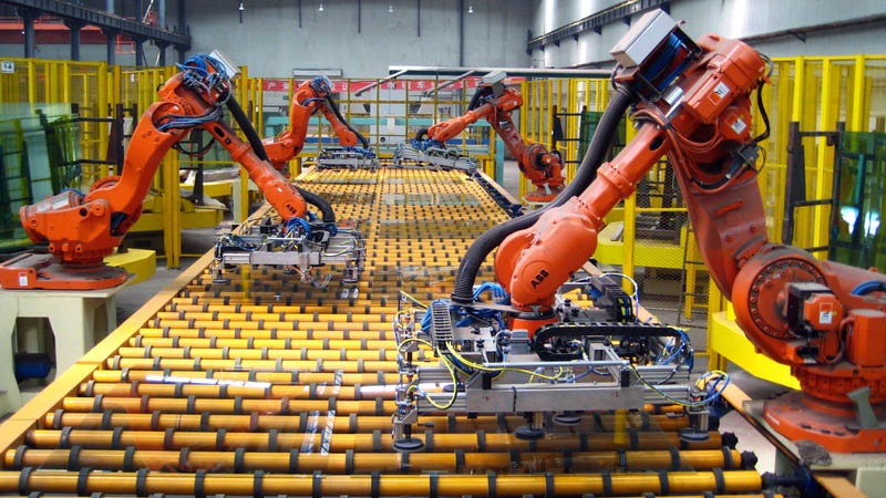 Robots in a factory (geobrava.wordpress.com)