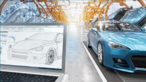 CAD wireframe of a car on a laptop beside the physical vehicle on the assembly line, linking digital twin and digital thread