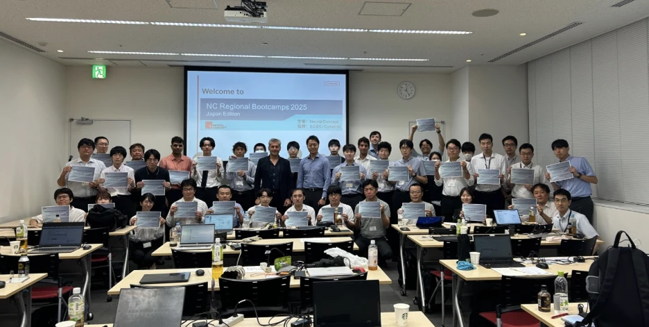 Participants holding certificates at the NC Regional Bootcamps 2025 Japan edition, welcome slide on screen